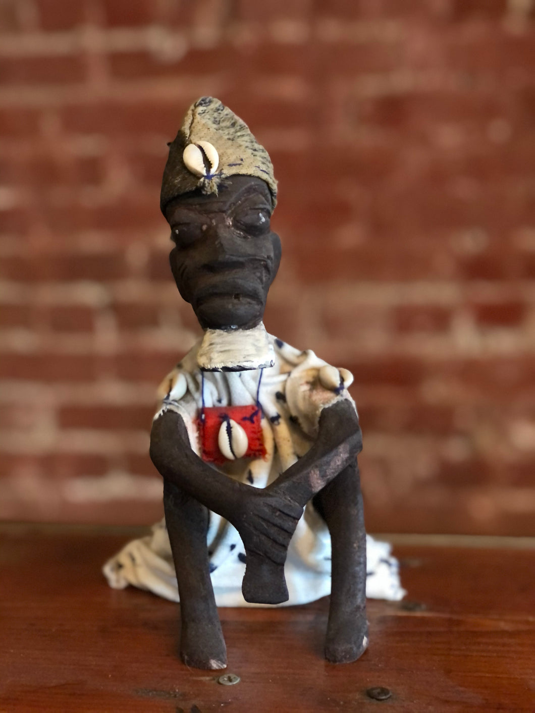 Squatting Man African Doll
